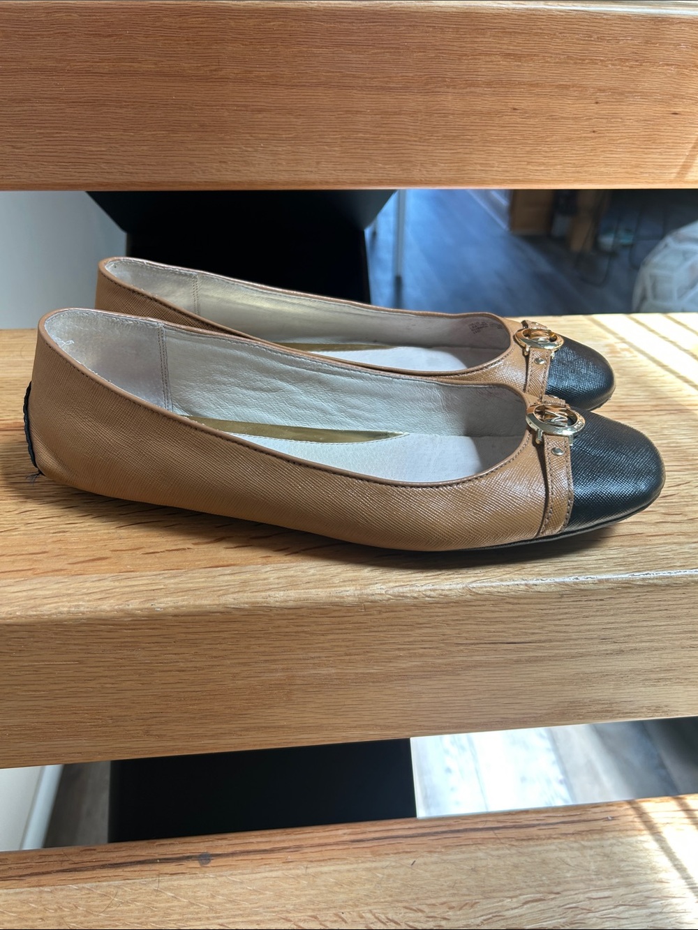Michael Kors Tan Ballet Flats with Black Cap Toe and Gold Hardware